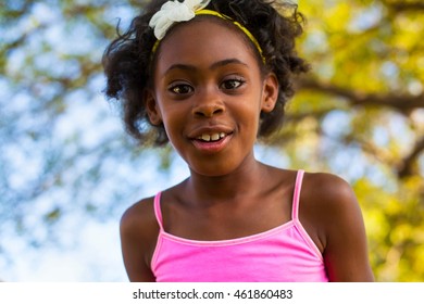 Portrait of girl with flower hairband - Powered by Shutterstock