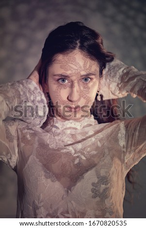 Similar – Image, Stock Photo a girl looking at the camera face down