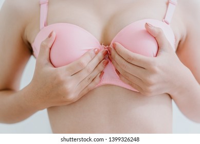 Woman Smashes Things With Her Breasts