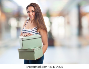 portrait of a girl holding a vintage boxes - Shutterstock ID 214314205