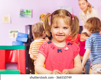 Portrait of a girl and kids group on background