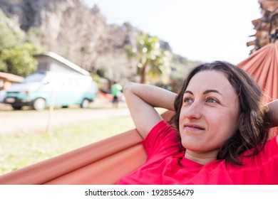 Portrait Of A Girl Lying In A Hammock, A Woman Resting In Nature, Traveling To Beautiful Places, Camping.