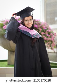 A Portrait Of A Girl On Her Graduation Day With The Convocation Robs And Hat