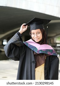 A Portrait Of A Girl On Her Graduation Day With The Convocation Robs And Hat