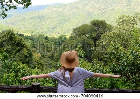 The portrait of a girl on a Thailand background. In a jungle in the north of Thailand.