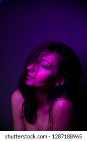 portrait of a girl purple light