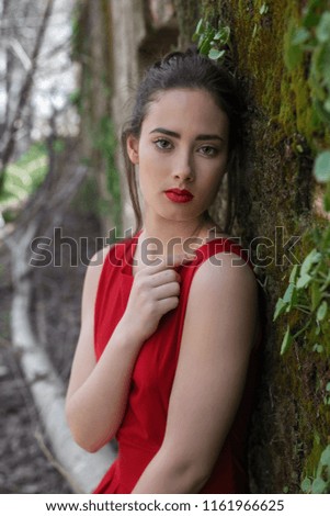 Portrait of girl in red dress