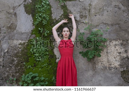 Portrait of girl in red dress