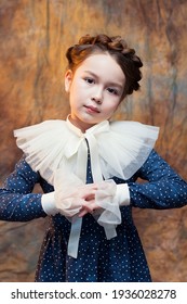 Portrait Of Girl With Ruff Collar.