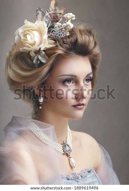 Portrait of a girl styled like an antic princess or\
countess dress like a\
paint