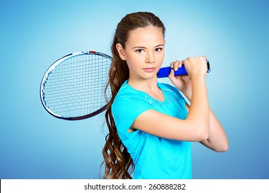 Portrait of a girl tennis player holding her racket. Studio shot. - Powered by Shutterstock