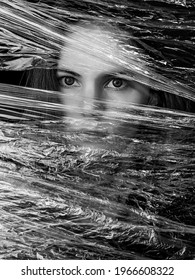 Portrait Of A Girl Through Cellophane, Black And White Photo