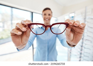 Portrait, Glasses And Woman With Poor Vision Trying Out A New Pair At Optometrist. Eyeglasses, Spectacles And Shopping Customer Buying Eyewear For Eye Health At Retail Store, Shop Or Mall.