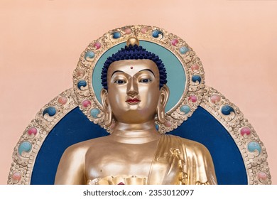 Portrait of the golden Buddha. Shakyamuni Buddha Statue, close-up - Powered by Shutterstock