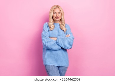 Portrait of gorgeous good mood cute girl with wavy hairdo dressed knitwear pullover hold arms folded isolated on pink color background - Powered by Shutterstock