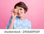 Portrait of gorgeous lady hand hold half lemon cover one eye empty space isolated on pink color background