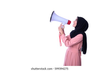 Portrait of a gorgeous Muslim young woman holding megaphone. Warning sign - Shutterstock ID 599394275
