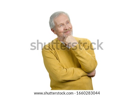 Portrait of grandpa in thoughtful pose. Concept of pensive grandfather. White isolated background.