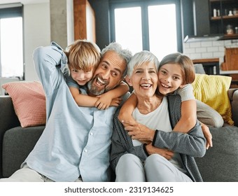 Portrait of grandparents and grandchildren having fun together at home - Powered by Shutterstock