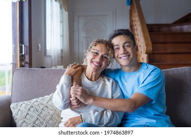 Portrait Of Grateful Teenager Man Hug Smiling Middle-aged Mother Show Love And Care, Thankful Happy Grown-up Son In Embrace Cheerful Mom, Enjoy Weekend Family Time At Home Together, Bonding Concept