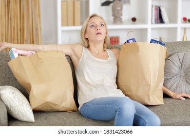 Portrait Of A Greedy Woman Resting After Shopping