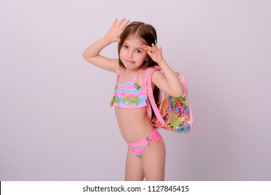 little girl in a swimsuit