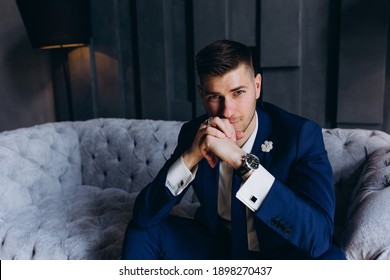 Portrait of the groom. The groom is preparing to meet the bride. Photoshoot of a successful businessman.
				