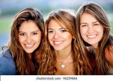 Portrait Of A Group Of Beautiful Female Friends Smiling