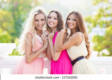 Portrait Of A Group Of Beautiful Young Female Friends Laughing