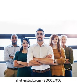 Portrait Of A Group Of Confident And Serious Professionals Standing Together With Arms Crossed And Copyspace. Serious Team Leader, Manager Or Entrepreneur Leading With Support Of Staff And