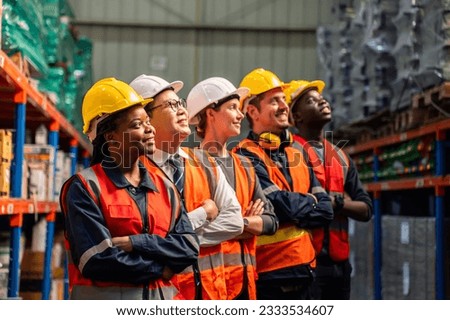 Portrait group of diverse industry worker working in factory warehouse. Young industrial engineer people process orders and product together at manufacturing plant then crossing arm with confidence.