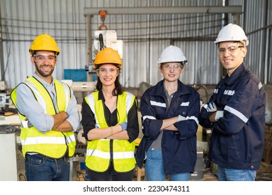 Portrait of group of male and female ethnic diverse engineer workers wear safety uniform, glasses and helmet working  in the industry factory - Powered by Shutterstock