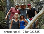 Portrait, group and smile in vacation, mountain and hiking in nature with sunglasses, summer and holiday. Outdoor, tourist and people with tour guide in Argentina and friends in environment or travel