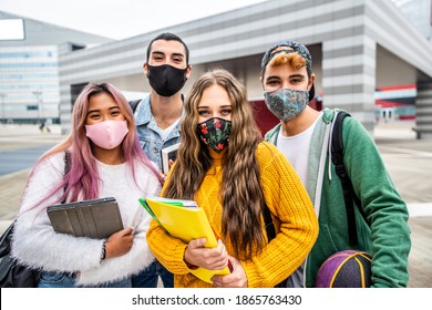 Portrait Of A Group Of Students Covered By Face Masks. New Normal Lifestyle Concept With Young People Going To School.