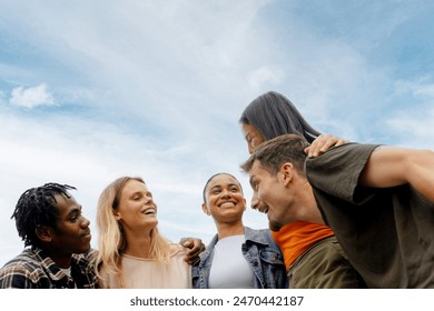 portrait of Group of young boys and girls together celebrating friendship and unity. Multiracial group of people - Powered by Shutterstock