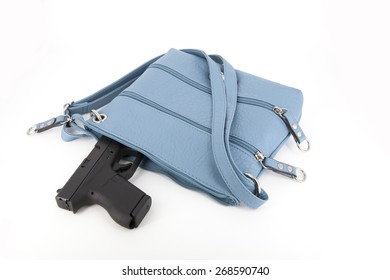 Portrait Of A Gun In A Concealed Carry Purse On White Background