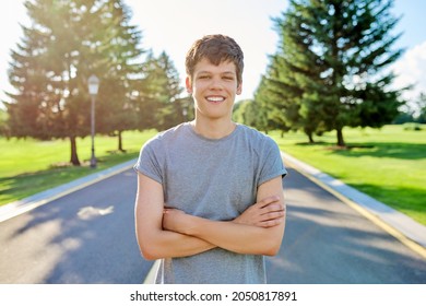 Portrait Of A Guy 16, 17 Years Old Looking At The Camera