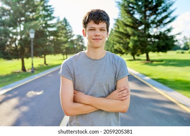 Portrait Of A Guy 16, 17 Years Old Looking At The Camera