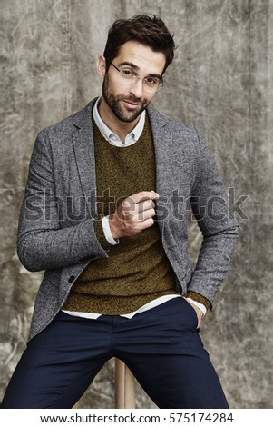 Similar – Guy with beard and modern hairstyle in the street.