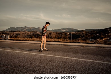 Portrait Guy With A Skateboard. Modern Skater Concept