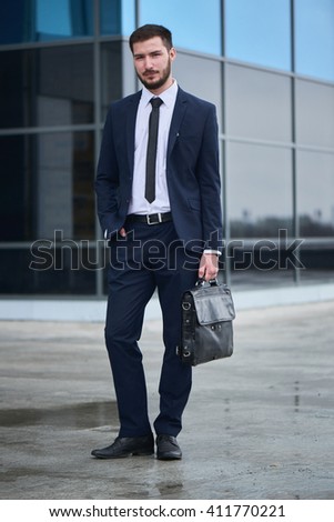 portrait guy suit briefcase hand on stock photo edit now 411770221