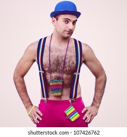 Portrait Of A Hairy Man Wearing Colorful Clothes, A Blue Hat And Rainbow Suspenders At The Pride Parade In Chicago. Taken With A Canon 5D Mark II And A Canon 70-200mm Lens. 