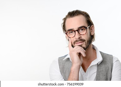 Portrait Of A Handsome 30 Years Old Young Man Isolated On A White Background