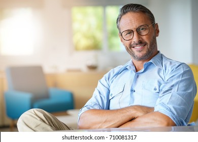 Portrait of handsome 45-year-old man with eyeglasses