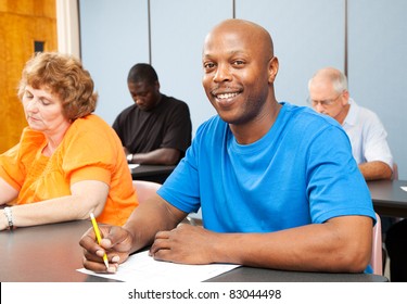 Portrait Of A Handsome African-american College Student In Adult Education Class.