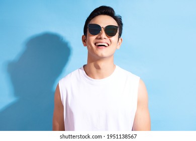 Portrait of handsome asian man wearing sunglasses, Summer vacation concept
 - Powered by Shutterstock