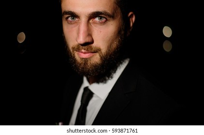 Portrait Of Handsome Bearded Man With Deep Green Eyes