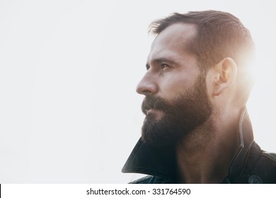 Portrait Of Handsome Bearded Man In Sunlight