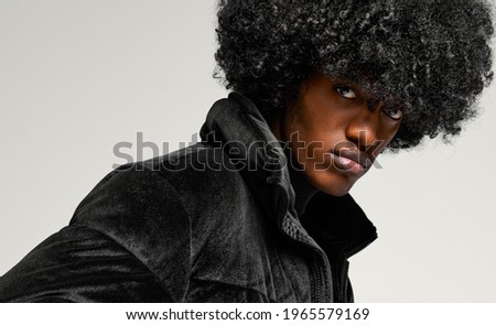 Similar – Image, Stock Photo Man in a coat standing on a sandy beach looking at a dog in the distance, with dunes and a blue sky overhead in Lariño, Galicia