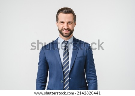 Portrait of handsome caucasian man in formal suit looking at camera smiling with toothy smile isolated in white background. Confident businessman ceo boss freelancer manager Stock foto © 